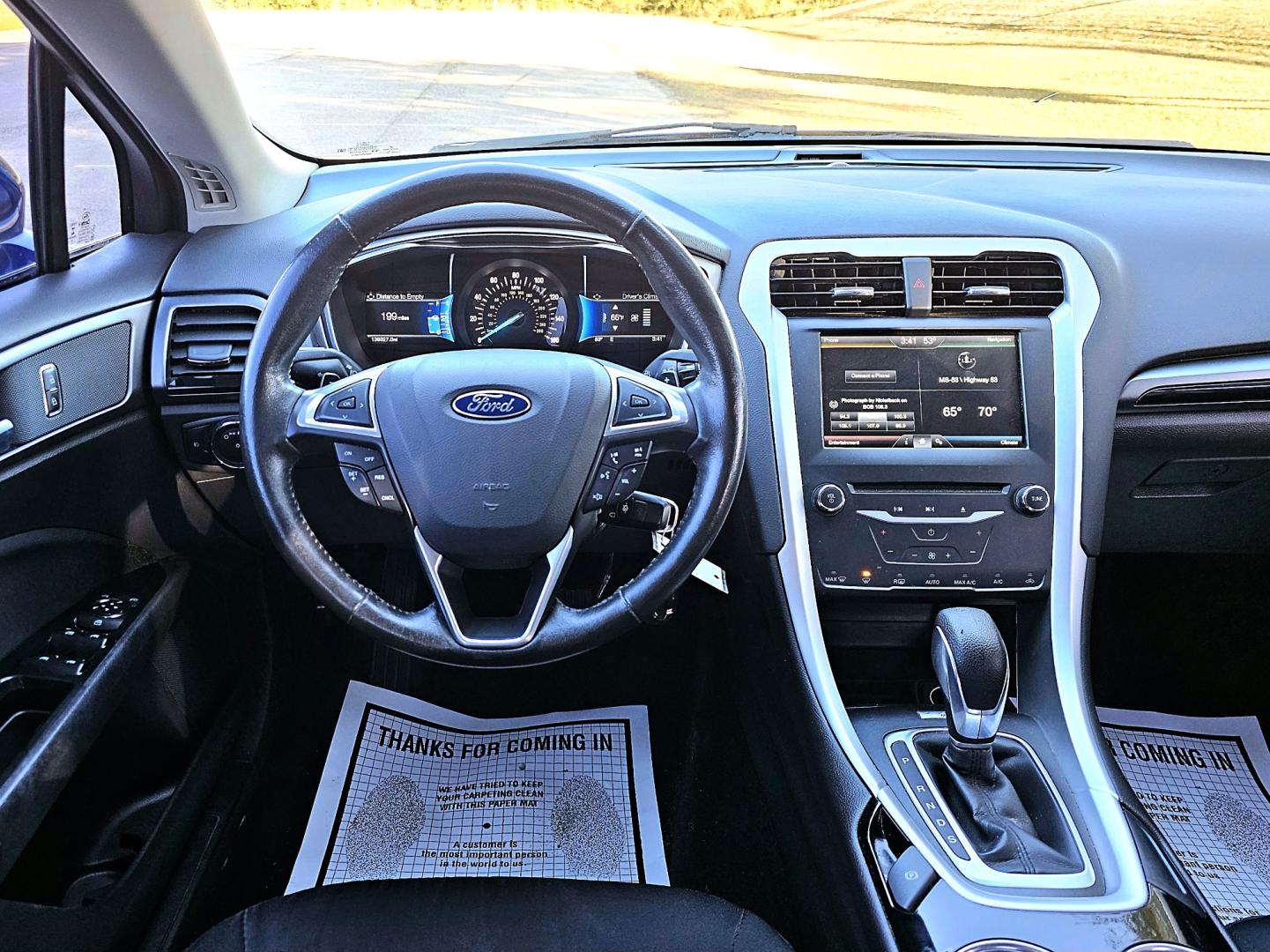 2015 Blue Ford Fusion SE (3FA6P0T96FR) with an 2.0L L4 DOHC 16V engine, Automatic transmission, located at 18001 Kellogg Rd, Saucier, MS, 39574, (228) 832-1441, 39.421459, -76.641457 - Photo#9